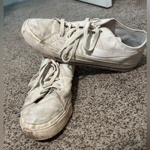 Casual Nike shoes. Size 11.5. White. Light staining, easy to clean